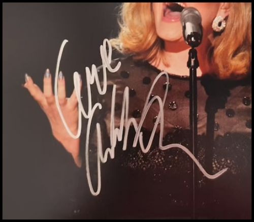 Adele Autographed ‘Performance’ Photograph