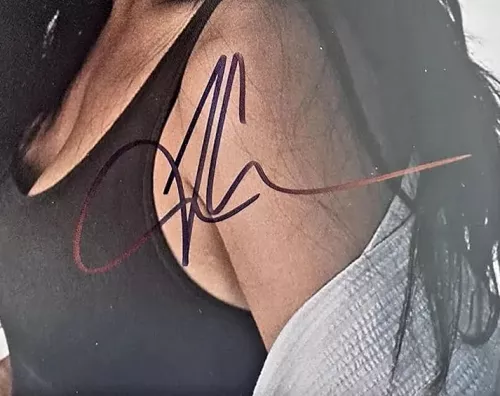 Tia Carrere Color Autographed Photograph